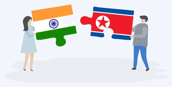 インドと北朝鮮の国旗を持つ2つのパズルピースを持つカップル インドと北朝鮮の国家シンボル — ストックベクタ