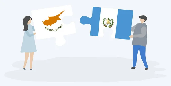 キプロスとグアテマラの旗を持つ2つのパズルのピースを保持しているカップル キプロスとグアテマラの国のシンボル — ストックベクタ