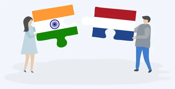 Couple Tenant Deux Pièces Puzzles Avec Des Drapeaux Indiens Néerlandais — Image vectorielle