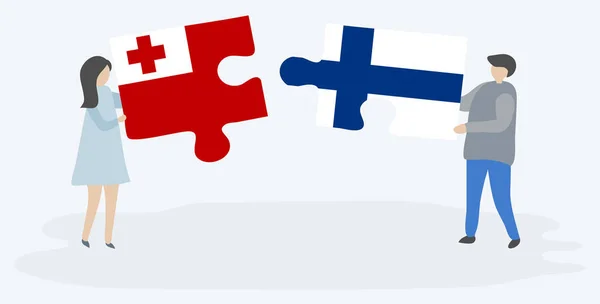 Пара Держащая Две Головоломки Финскими Тонганскими Флагами Тонга Финляндия Вместе — стоковый вектор