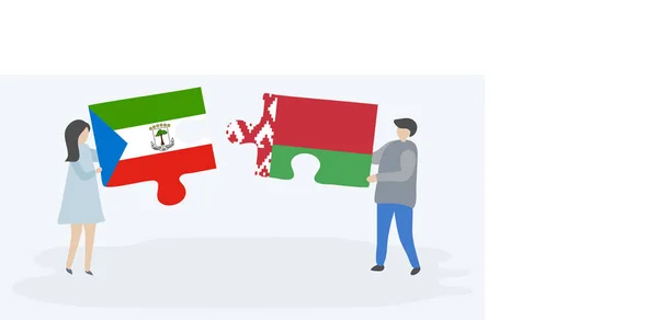 一对夫妇拿着两块拼图 上面挂着赤道几内亚和白俄罗斯国旗 赤道几内亚和白俄罗斯国家符号在一起 — 图库矢量图片
