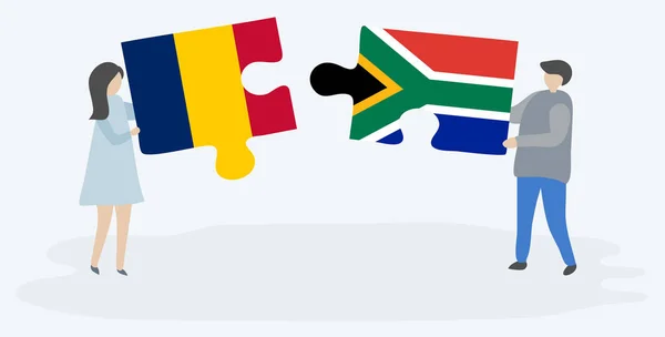 チャドと南アフリカの旗を持つ2つのパズルのピースを保持しているカップル チャドと南アフリカの国のシンボル — ストックベクタ