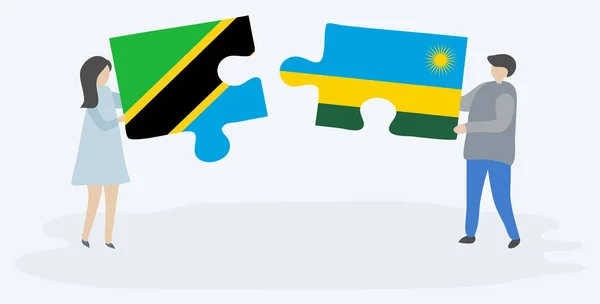 Couple Holding Two Puzzles Pieces Tanzanian Rwandan Flags Tanzania Rwanda — Stock Vector