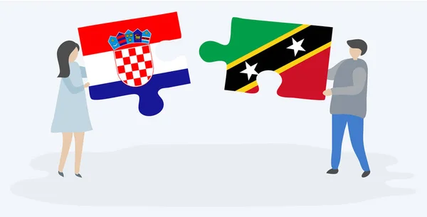 Ζευγάρι Που Κατέχει Δύο Κομμάτια Παζλ Κροατικές Και Kittitian Σημαίες — Διανυσματικό Αρχείο