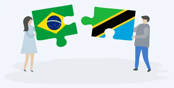 Couple Holding Two Puzzles Pieces Brazilian Tanzanian Flags Brazil Tanzania — Stock Vector