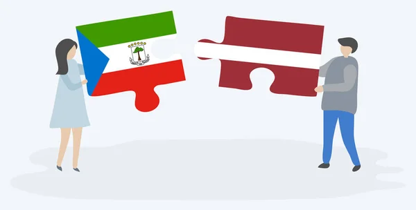 Para Trzyma Dwa Kawałki Puzzli Równikowej Gwinei Łotewskich Flag Gwinea — Wektor stockowy
