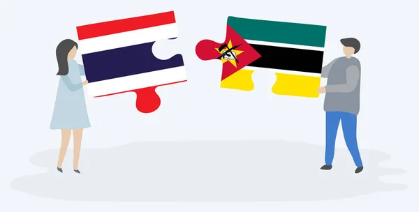 Couple Tenant Deux Pièces Puzzles Avec Des Drapeaux Thaïlandais Mozambicains — Image vectorielle