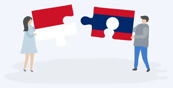 Para Trzyma Dwa Kawałki Puzzli Indonezyjskich Lao Flagi Symbole Narodowe — Wektor stockowy