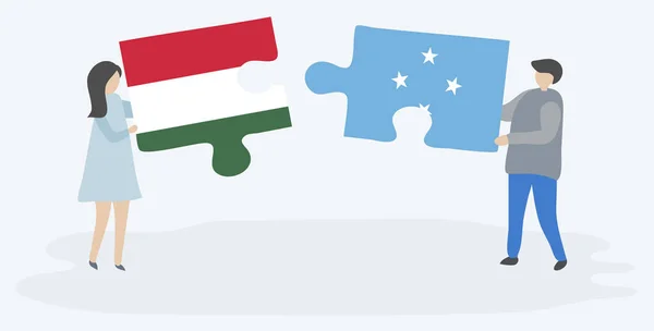 Paar Houden Twee Puzzels Stukken Met Hongaarse Micronesian Vlaggen Hongarije — Stockvector