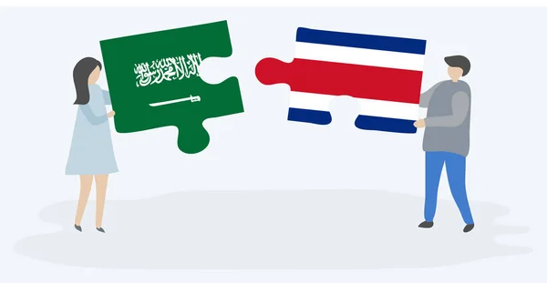 Casal Segurando Duas Peças Quebra Cabeças Com Bandeiras Arábia Saudita — Vetor de Stock