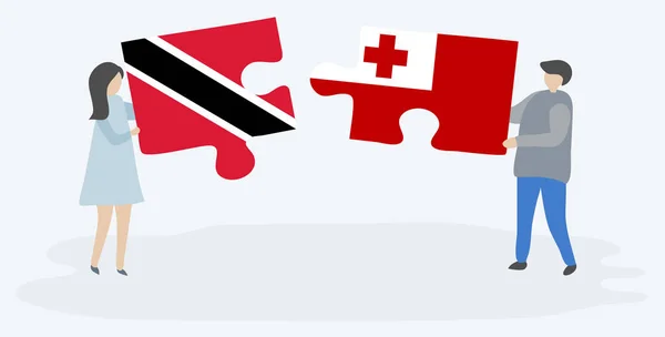 Casal Segurando Duas Peças Quebra Cabeças Com Bandeiras Trinidadianas Tonganas — Vetor de Stock