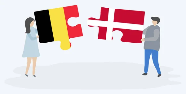 Casal Segurando Duas Peças Quebra Cabeças Com Bandeiras Belgas Dinamarquesas — Vetor de Stock