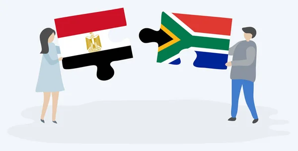 Couple Tenant Deux Pièces Puzzles Avec Des Drapeaux Égyptiens Sud — Image vectorielle