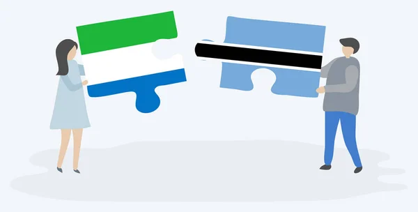Paar Houden Twee Puzzels Stukken Met Sierra Leonean Motswana Vlaggen — Stockvector