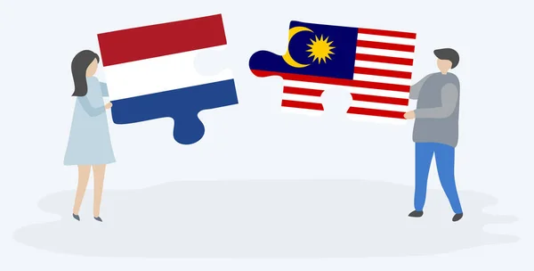 Paar Mit Zwei Puzzleteilen Mit Holländischen Und Malaysischen Flaggen Niederländische — Stockvektor