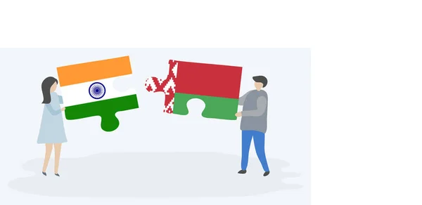 インドとベラルーシの旗を持つ2つのパズルのピースを保持しているカップル インドとベラルーシの国のシンボル — ストックベクタ