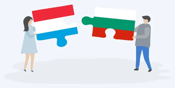 Néhány Holding Két Rejtvények Darab Luxemburgi Bolgár Zászlókat Luxemburg Bulgária — Stock Vector