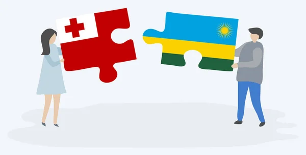 Paar Mit Zwei Puzzleteilen Mit Tongan Und Ruandischen Flaggen Nationale — Stockvektor