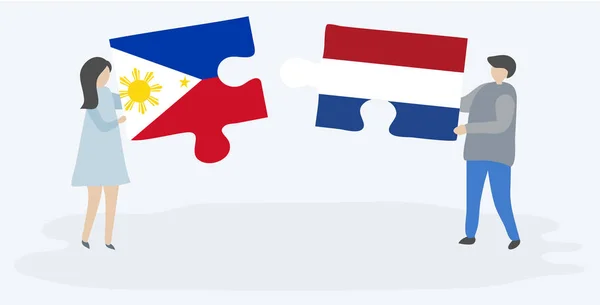 Par Som Innehar Två Pusselbitar Med Filippinska Och Holländska Flaggor — Stock vektor