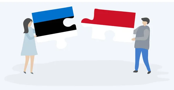 Paar Houden Twee Puzzels Stukken Met Ests Monegaskische Vlaggen Estland — Stockvector