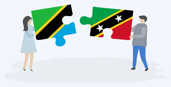 Paar Houden Twee Puzzels Stukken Met Tanzaniaanse Kittitian Vlaggen Tanzania — Stockvector