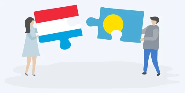 Pareja Sosteniendo Dos Piezas Rompecabezas Con Banderas Luxemburgo Palaos Luxemburgo — Vector de stock