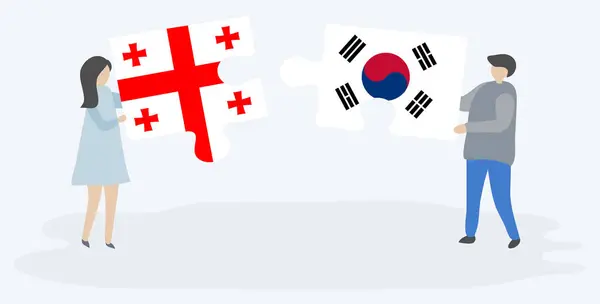 Gürcü Güney Kore Bayrakları Ile Iki Bulmaca Parçaları Tutan Çift — Stok Vektör