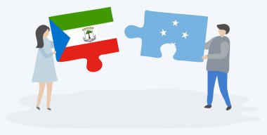 Çift Ekvator Ginesi ve Mikronezya bayrakları ile iki bulmaca parçaları tutan. Ekvator Ginesi ve Mikronezya ulusal sembolleri birlikte.