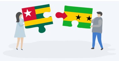 Togolese ve Sao Tomean bayrakları ile iki bulmaca parçaları tutan çift. Togo ve Sao Tome ve Principe ulusal sembolleri birlikte.