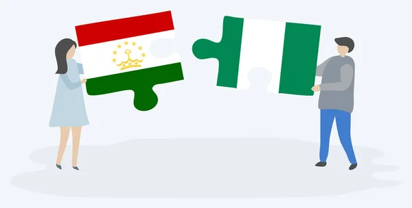 Coppia Con Due Pezzi Puzzle Con Bandiere Tagikistane Nigeriane Tagikistan — Vettoriale Stock