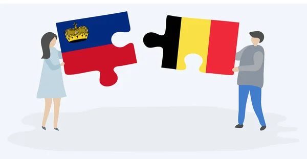 Casal Segurando Duas Peças Quebra Cabeças Com Liechtenstein Bandeiras Belgas — Vetor de Stock