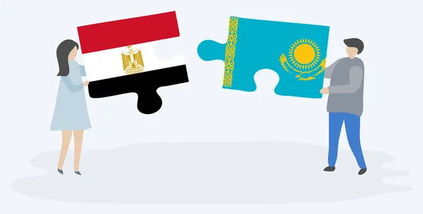 Dvojice Egyptskými Kazašskými Vlajkami Drží Dvě Skládanky Národní Symboly Egypta — Stockový vektor