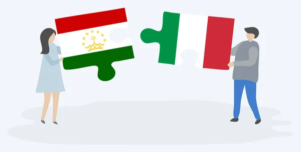 Casal Segurando Duas Peças Quebra Cabeças Com Bandeiras Tajiquistanesas Italianas —  Vetores de Stock