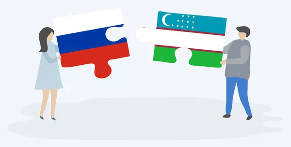 Paar Houden Twee Puzzels Stukken Met Russische Oezbeekse Vlaggen Rusland — Stockvector