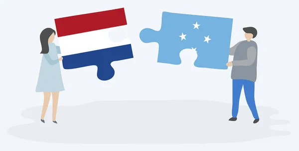 Paar Houden Twee Puzzels Stukken Met Nederlandse Micronesian Vlaggen Nederlandse — Stockvector