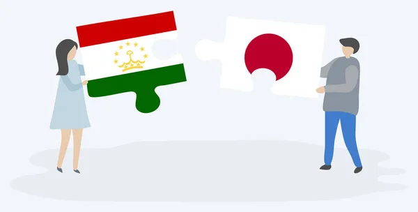 Couple Tenant Deux Pièces Puzzles Avec Des Drapeaux Tadjiks Japonais — Image vectorielle