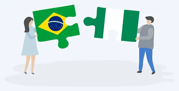 Casal Segurando Duas Peças Quebra Cabeças Com Bandeiras Brasileiras Nigerianas — Vetor de Stock