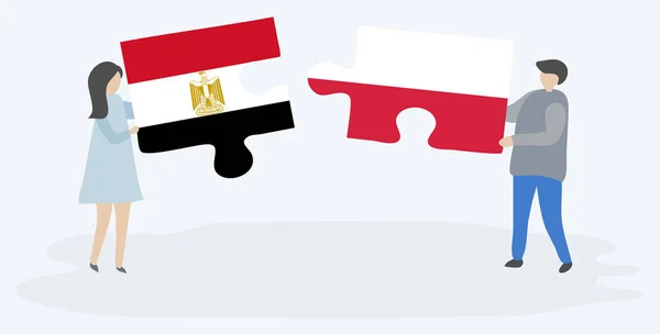 一对夫妇拿着两个拼图 上面挂着埃及和波兰国旗 埃及和波兰国家符号在一起 — 图库矢量图片