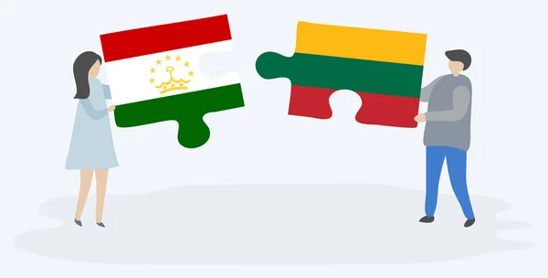 タジキスタンとリトアニアの旗を持つ2つのパズルピースを保持しているカップル タジキスタンとリトアニアの国のシンボル — ストックベクタ