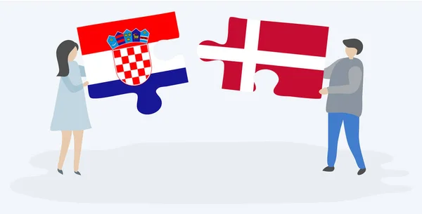 Pareja Sosteniendo Dos Piezas Rompecabezas Con Banderas Croatas Danesas Croacia — Archivo Imágenes Vectoriales
