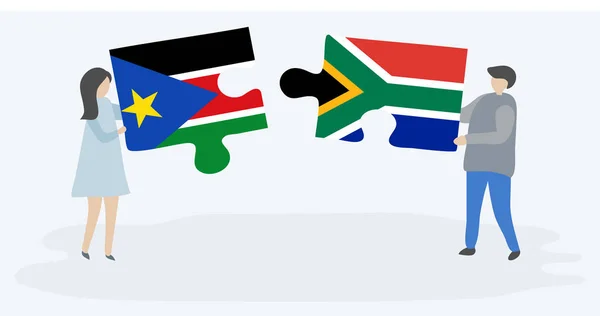 Par Som Innehar Två Pusselbitar Med Sydsudanesiska Och Sydafrikanska Flaggor — Stock vektor
