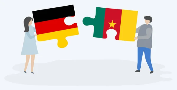 Casal Segurando Duas Peças Quebra Cabeças Com Bandeiras Alemãs Camaronesas — Vetor de Stock