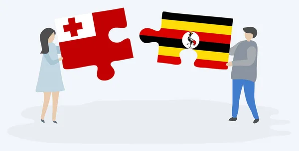 Para Trzyma Dwa Kawałki Puzzli Tongan Ugandy Flagi Symbole Narodowe — Wektor stockowy