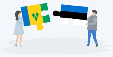 Vincent ve Estonya bayrakları ile iki bulmaca parçaları tutan çift. Saint Vincent ve Grenadinler ve Estonya ulusal sembolleri birlikte.