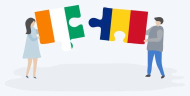 Fildişi ve Romen bayrakları ile iki bulmaca parçaları tutan çift. Fildişi Sahili ve Romanya ulusal sembolleri birlikte.