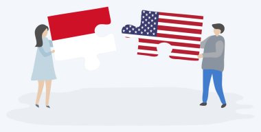 Monegasque ve Amerikan bayrakları ile iki bulmaca parçaları tutan çift. Monako ve Amerika Birleşik Devletleri ulusal semboller i.