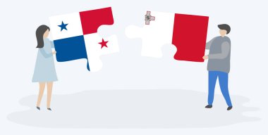 Panama ve Malta bayraklarıyla iki bulmaca tutan çift. Panama ve Malta ulusal sembolleri birlikte.