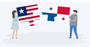 Liberya ve Panama bayrakları ile iki bulmaca parçaları tutan çift. Liberya ve Panama ulusal sembolleri birlikte.