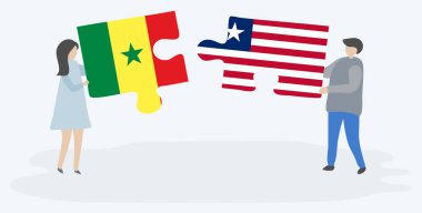 Senegal ve Liberya bayrakları ile iki bulmaca parçaları tutan çift. Senegal ve Liberya ulusal sembolleri birlikte.