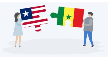 Liberya ve Senegal bayrakları ile iki bulmaca parçaları tutan çift. Liberya ve Senegal ulusal sembolleri birlikte.
